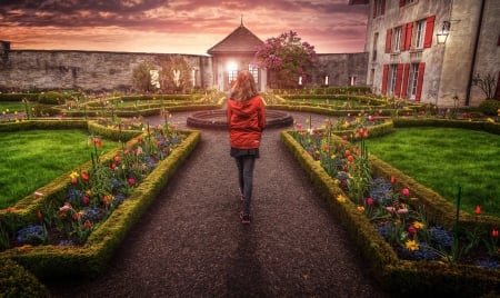 Girl in Castle Garden - flowers, clouds, path, tulips, sunset, sky, wall, building