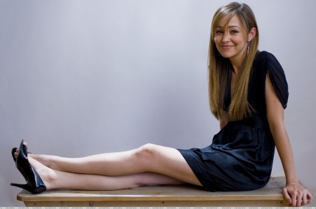 Autumn Reeser - posing on table, high waist line, blue, blue dress, earrings, open toed heels, nice smile, brunette