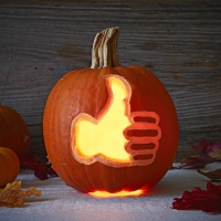 Thumbs Up Carved Pumpkin