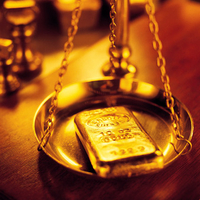 Gold Bullion Bar on the Scales.jpg