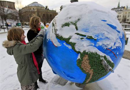 Clearing The Snow off the Earth - people, places, photography