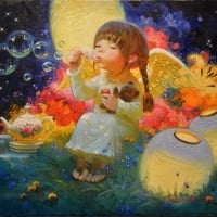 Little angel making bubbles