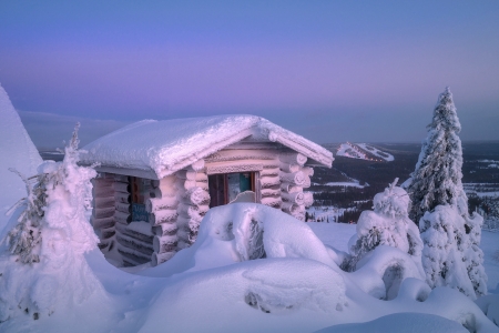 Wooden hut in winter