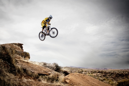 A jump - fun, leap, people, photography, bike, outdoors, daredevils, sport, activiti, jump