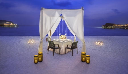 Romantic evening - beach, candles, dinner, resort