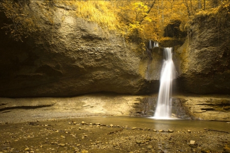 Waterfall Shrouded in a Golden Light