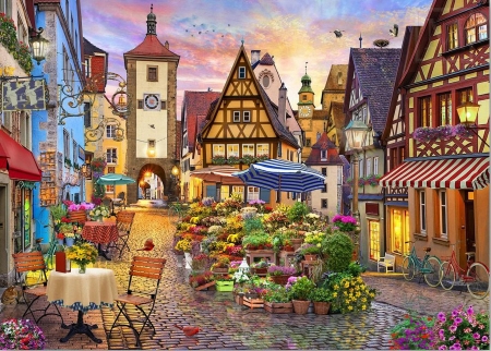 Bavarian Town - chairs, restaurant, table, bicycles, tower, street, flowers, houses