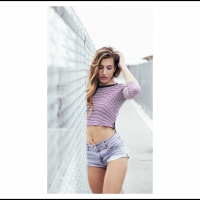 Girl At Chain Link Fence