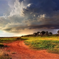 clouds running towards the ocean