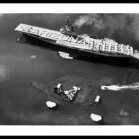 Aircraft Carrier Passing By The USS Arizona