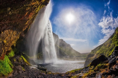 Seljalandsfoss Waterfall, Iceland - river, mountains, stones, sun, sky