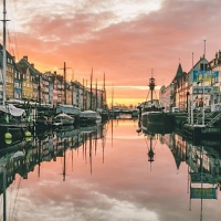 Sun setting at Nyhavn, Copenhagen, Denmark