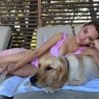 Hunter H King posing with her dog