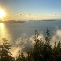 A Lake Superior sunrise, looking out over the Susie Islands and Isle Royale. Grand Portage, MN