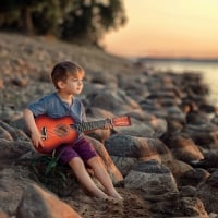 Little boy with a guitar