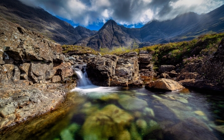 The fairy pools, Isle of Skye, Scotland - clouds, water, cascade, mountains, stones, sky