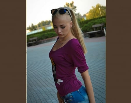 Ulyana Verenchikova - denim shorts, trees, earringe, blonde, purple t shirt, necklace, seat, blue tiled area, sunglasses