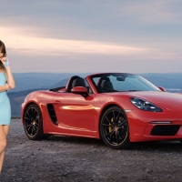 Riley Reid Posing with a Porsche Boxster