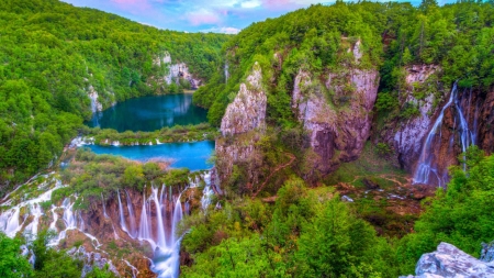 Plitvice Waterfalls, Slovenia - cascades, trees, mountains, rocks, sky