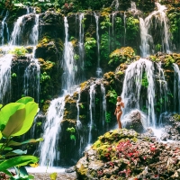 Bikini Model Posing at a Waterfall