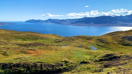 Iceland in a place called Stoedvafjoerdur - sea, hills, clouds, landscape, bay, sky