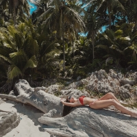 Bikini Model Working on her Tan