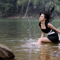 Model in a Black Dress( Washing her hair?)