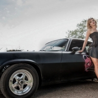 Blonde Posing with a Camaro Z28