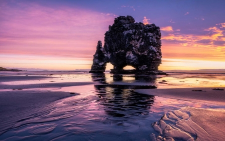 A fiery sunrise at the Rhino rock in Iceland - Sunsets & Nature
