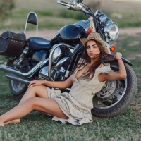 Cowgirl with her Motorcycle