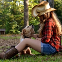 Cowgirl with dog