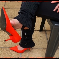 Orange stiletto heels