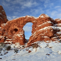 A slice of giant frosted carrot cake at Turret Arch in Utah