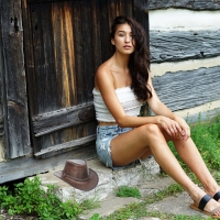 Cowgirl resting on her stoop