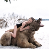 Swimsuit Model Posing on a Bear