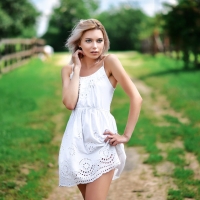 Blonde in a White Dress