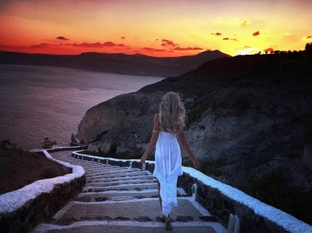 ANDREANE CAMBERLAND - white gown, sunset, jewelry, blonde, walking down steps, bay