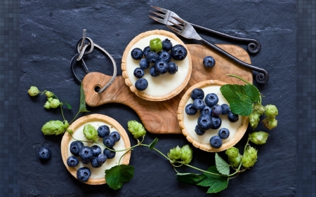 Tarts with Bilberries - bilberries, tarts, board, forks