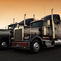 Two Kenworth's Parked For The Night At A Motel...........