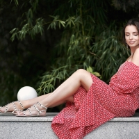 Brunette Posing in a Red and White Dress