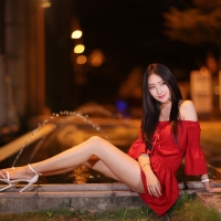 Kiki Hsieh in a Red Dress