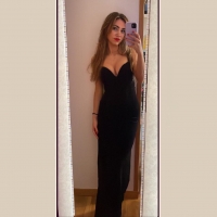 Brunette in black evening dress