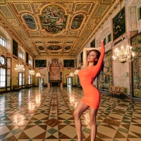 Audrey Oblap posing in a Palace Ballroom