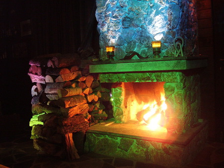  a fireplace - a fireplace illuminated, somewhere in a winter