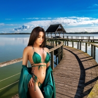 Model Posing in a Green Bikini