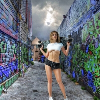 Model with her Long Board in a Back Alley