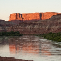 Sunrise reflected on a placid Green River, Canyonlands NP, Utah