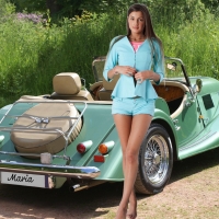 Maria Ryabushkina Posing with a Sports Car