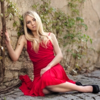 Blonde Posing in a Red Dress