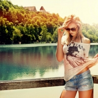 Blonde by a river